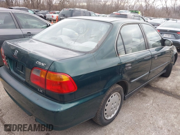2000 Honda Civic LX with VIN 1HGEJ6673YL069805, listed as a IAAI auction lot 41511192 with 80,097 mi miles. Bid and sale history available at carsss.com. Image 4.