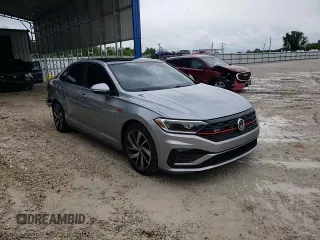 2019 Volkswagen Jetta GLI S z VIN 3VW6T7BU4KM222404, wystawiony jako Copart lot #55097435 z przebiegiem 121 664 mil mil oraz Szkoda całkowita • Salvage title. Historia ofert i sprzedaży dostępna na DreamBid. Obrazek 14.