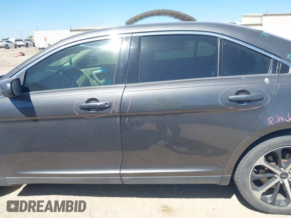 2015 Ford Taurus SEL with VIN 1FAHP2E84FG177553, listed as a IAAI auction lot 41753755 with 153,252 mi miles and . Bid and sale history available at carsss.com. Image 15.