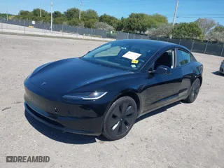 2024 Tesla Model 3 with VIN 5YJ3E1EA4RF745385, listed as a IAAI auction lot 41772450 with 11,856 mi miles. Bid and sale history available at carsss.com. Image 2.