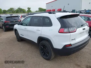 2023 Jeep Cherokee Altitude Lux with VIN 1C4PJMMB6PD112545, listed as a IAAI auction lot 41875820 with 53,559 mi miles. Bid and sale history available at carsss.com. Image 3.