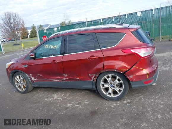 2015 Ford Escape Titanium with VIN 1FMCU9J91FUA26624, listed as a IAAI auction lot 40854175 with 132,313 mi miles. Bid and sale history available at carsss.com. Image 14.