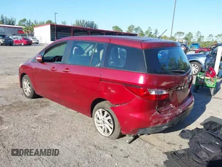 2014 Mazda Mazda5 Sport with VIN JM1CW2BLXE0163650, listed as a IAAI auction lot 42024762 with 137,314 mi miles. Bid and sale history available at carsss.com. Image 3.