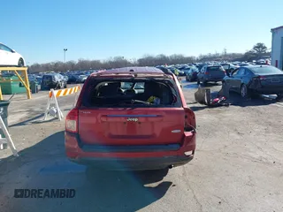 2014 Jeep Compass High Altitude with VIN 1C4NJCEA3ED539489, listed as a IAAI auction lot 41653313 with 124,462 mi miles. Bid and sale history available at carsss.com. Image 16.