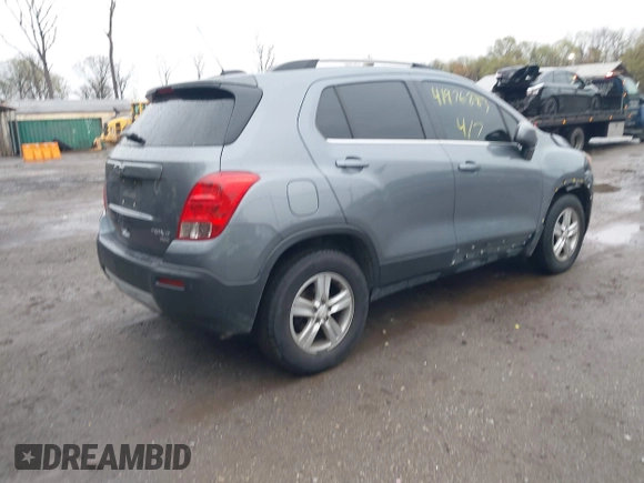 2015 Chevrolet Trax LT with VIN KL7CJRSBXFB097960, listed as a IAAI auction lot 41976883 with 98,621 mi miles and . Bid and sale history available at carsss.com. Image 4.