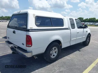2003 Ford F-150 XL with VIN 1FTRX17W53NA40472, listed as a IAAI auction lot 42491035 with Not provided miles and . Bid and sale history available at DreamBid. Image 4.