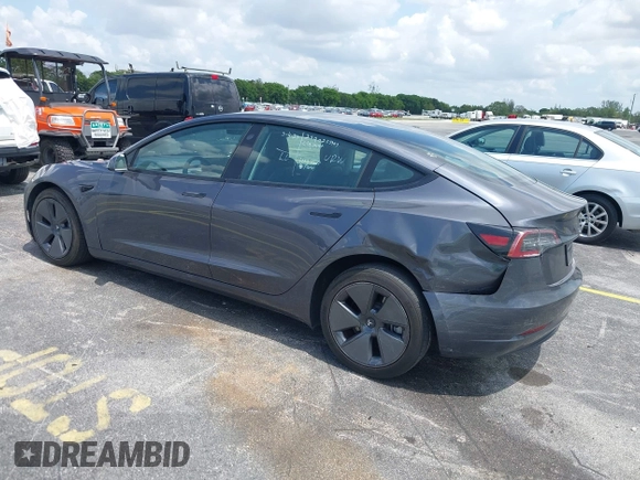 2023 Tesla Model 3 z VIN 5YJ3E1EA3PF435158, wystawiony jako IAAI lot #42356031 z przebiegiem 41 408 mil mil oraz . Historia ofert i sprzedaży dostępna na DreamBid. Obrazek 3.