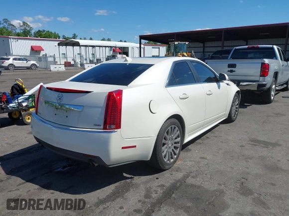2013 Cadillac CTS Performance with VIN 1G6DK5E37D0138249, listed as a IAAI auction lot 41991166 with 121,133 mi miles and . Bid and sale history available at DreamBid. Image 4.