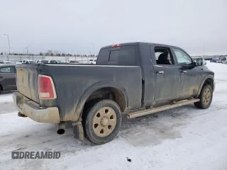 2014 Ram 3500 Laramie with VIN 3C63R3ML6EG325772, listed as a Copart auction lot 87158104 with 495,759 mi miles and Salvage Title. Bid and sale history available at carsss.com. Image 3.