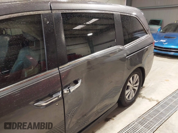 2015 Honda Odyssey EX-L with VIN 5FNRL5H65FB126479, listed as a IAAI auction lot 38993955 with 196,199 mi miles and . Bid and sale history available at carsss.com. Image 17.