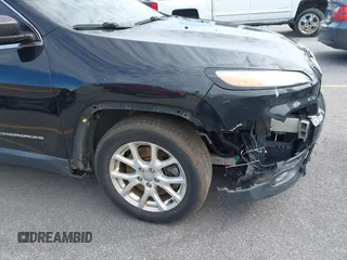 2014 Jeep Cherokee Latitude with VIN 1C4PJLCB0EW288309, listed as a IAAI auction lot 41624746 with 164,037 mi miles and . Bid and sale history available at DreamBid. Image 17.