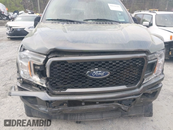 2018 Ford F-150 XL with VIN 1FTEW1C50JFD23545, listed as a IAAI auction lot 41838209 with 129,906 mi miles and . Bid and sale history available at DreamBid. Image 6.