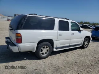 2003 GMC Yukon XL Denali with VIN 1GKFK66U63J265154, listed as a Copart auction lot 52967605 with 276,733 mi miles and Salvage Title. Bid and sale history available at carsss.com. Image 3.