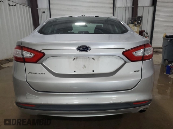 2013 Ford Fusion SE with VIN 3FA6P0H79DR339858, listed as a Copart auction lot 61156225 with 106,676 mi miles and Salvage title. Bid and sale history available at DreamBid. Image 6.