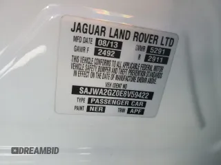 2014 Jaguar XJ Portfolio z VIN SAJWA2GZ0E8V59422, wystawiony jako Copart lot #74213414 z przebiegiem 96 314 mil mil oraz Nie do naprawy • Non repairable. Historia ofert i sprzedaży dostępna na DreamBid. Obrazek 13.
