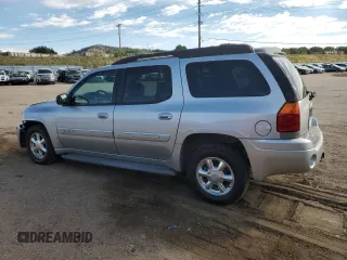 2005 GMC Envoy SLT with VIN 1GKET16M656181157, listed as a Copart auction lot 72980874 with 243,975 mi miles and Salvage Title. Bid and sale history available at DreamBid. Image 2.