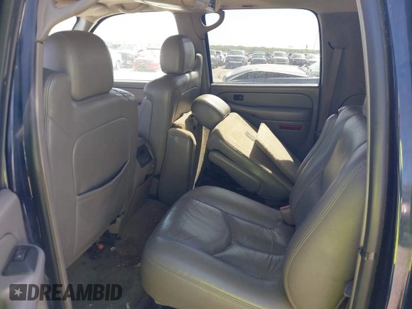 2005 Chevrolet Suburban LT with VIN 1GNFK16Z45J157703, listed as a IAAI auction lot 41840882 with 337,113 mi miles and . Bid and sale history available at DreamBid. Image 13.