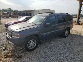 2004 Jeep Grand Cherokee Laredo z VIN 1J4GX48S74C257808, wystawiony jako Copart lot #54852785 z przebiegiem 120 514 mil mil oraz Szkoda całkowita • Salvage title. Historia ofert i sprzedaży dostępna na DreamBid. Obrazek 1.