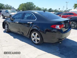 2010 Acura TSX with VIN JH4CU2F63AC040712, listed as a IAAI auction lot 42018157 with 159,730 mi miles. Bid and sale history available at carsss.com. Image 3.