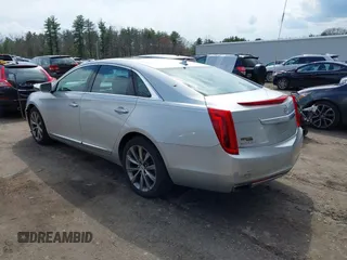 2013 Cadillac XTS Luxury z VIN 2G61P5S33D9170453, wystawiony jako IAAI lot #41928607 z przebiegiem 68 094 mil mil oraz . Historia ofert i sprzedaży dostępna na DreamBid. Obrazek 3.