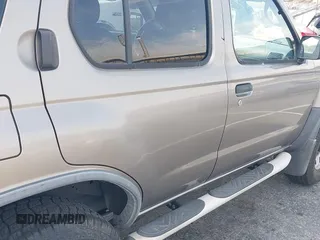 2003 Nissan Xterra XE z VIN 5N1DD28T73C688304, wystawiony jako IAAI lot #42358887 z przebiegiem 200 486 mil mil oraz . Historia ofert i sprzedaży dostępna na DreamBid. Obrazek 6.