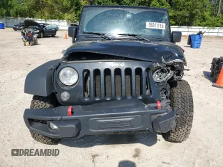 2016 Jeep Wrangler Unlimited Rubicon Hard Rock z VIN 1C4BJWFG6GL125252, wystawiony jako Copart lot #55241115 z przebiegiem 193 554 mil mil oraz Szkoda całkowita • Salvage title. Historia ofert i sprzedaży dostępna na DreamBid. Obrazek 5.