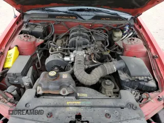 2005 Ford Mustang Deluxe z VIN 1ZVHT80N855181893, wystawiony jako Copart lot #51479185 z przebiegiem 98 450 mil mil oraz Szkoda całkowita • Salvage title. Historia ofert i sprzedaży dostępna na DreamBid. Obrazek 11.