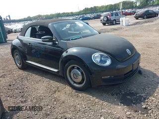 2013 Volkswagen Beetle 2.5L with VIN 3VW5X7AT5DM805978, listed as a IAAI auction lot 42429397 with 62,408 mi miles and . Bid and sale history available at DreamBid. Image 1.