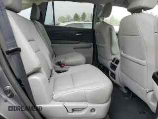 2020 Honda Pilot Touring 7-Passenger z VIN 5FNYF6H69LB005829, wystawiony jako Copart lot #52702555 z przebiegiem 90 746 mil mil oraz Szkoda całkowita • Salvage title. Historia ofert i sprzedaży dostępna na DreamBid. Obrazek 11.