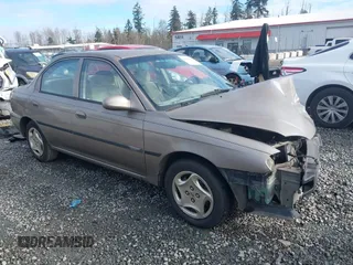 2001 Kia Sephia with VIN KNAFB121815046919, listed as a IAAI auction lot 41398257 with 191,818 mi miles and . Bid and sale history available at DreamBid. Image 1.