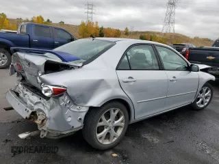2006 Mazda 6 i with VIN 1YVFP80CX65M55409, listed as a Copart auction lot 76844234 with 143,238 mi miles and Salvage Title. Bid and sale history available at carsss.com. Image 3.