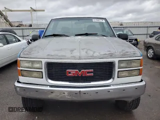 1989 GMC Sierra 2500 z VIN 1GTGK24K8KE532683, wystawiony jako Copart lot #51434114 z przebiegiem 79 134 mil mil oraz Szkody całkowita. Historia ofert i sprzedaży dostępna na DreamBid. Obrazek 5.