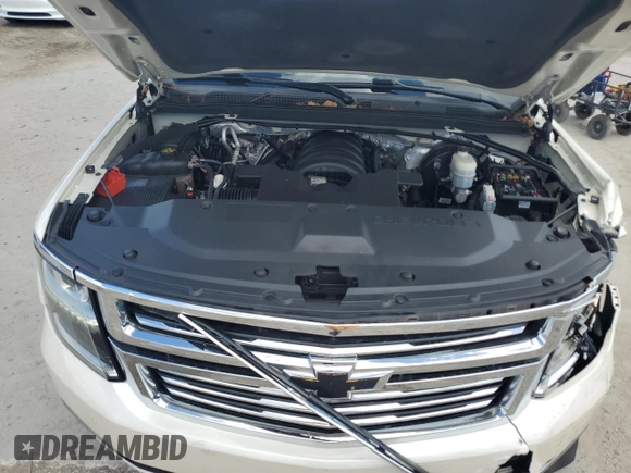 2015 Chevrolet Suburban LTZ with VIN 1GNSKKKC0FR130023, listed as a Copart auction lot 46630825 with 140,057 mi miles and Salvage Title. Bid and sale history available at carsss.com. Image 12.
