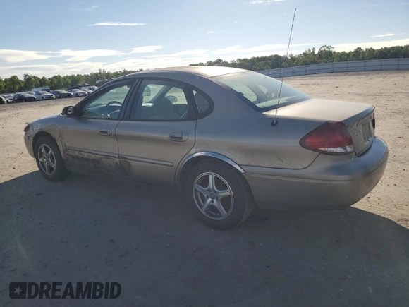 2004 Ford Taurus SE z VIN 1FAFP53284A156633, wystawiony jako Copart lot #58164985 z przebiegiem 91 246 mil mil oraz Szkoda całkowita • Salvage title. Historia ofert i sprzedaży dostępna na DreamBid. Obrazek 2.