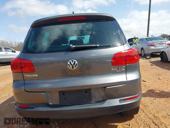 2015 Volkswagen Tiguan SE z VIN WVGBV7AXXFW503955, wystawiony jako IAAI lot #41730076 z przebiegiem 146 446 mil mil oraz . Historia ofert i sprzedaży dostępna na DreamBid. Obrazek 17.