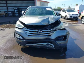 2013 Hyundai Santa Fe Sport z VIN 5XYZWDLA9DG064393, wystawiony jako IAAI lot #41601453 z przebiegiem 71 136 mil mil oraz . Historia ofert i sprzedaży dostępna na DreamBid. Obrazek 12.