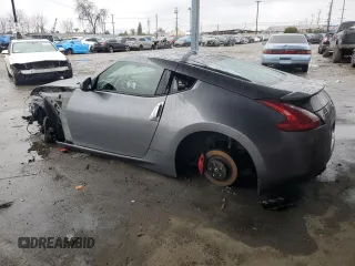 2016 Nissan 370Z Sport с VIN JN1AZ4EH3GM936250, выставлен на аукционе Copart как лот 44227205 с пробегом Не указан миль и Списание • Salvage title. История ставок и продаж доступна на DreamBid. Изображение 2.