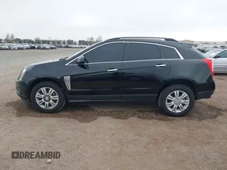 2015 Cadillac SRX with VIN 3GYFNAE37FS598023, listed as a IAAI auction lot 41198546 with 127,373 mi miles and . Bid and sale history available at carsss.com. Image 14.