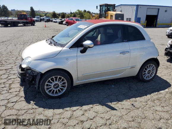 2013 FIAT 500 Lounge with VIN 3C3CFFER9DT744019, listed as a Copart auction lot 63481055 with 49,869 mi miles and Salvage title. Bid and sale history available at DreamBid. Image 1.