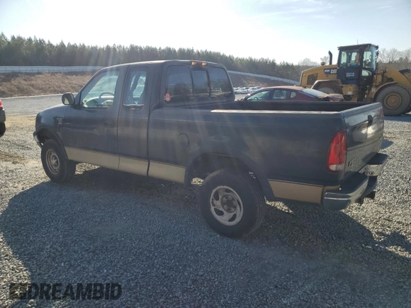 1999 Ford F-150 with VIN 1FTRX18W0XNC03906, listed as a Copart auction lot 42742555 with Not provided miles and Salvage title. Bid and sale history available at DreamBid. Image 2.