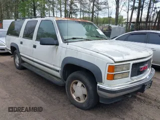 1999 GMC Suburban with VIN 1GKFK16R4XJ798754, listed as a IAAI auction lot 41998578 with 266,899 mi miles. Bid and sale history available at carsss.com. Image 1.