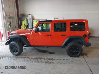 2023 Jeep Wrangler Sport with VIN 1C4HJXDG7PW676453, listed as a IAAI auction lot 42222995 with 32,347 mi miles and . Bid and sale history available at DreamBid. Image 14.