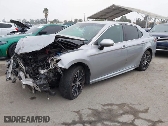 2019 Toyota Camry LE z VIN 4T1B11HK7KU713082, wystawiony jako IAAI lot #42151362 z przebiegiem 93 546 mil mil oraz . Historia ofert i sprzedaży dostępna na DreamBid. Obrazek 18.