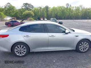 2018 Kia Optima EX with VIN 5XXGU4L34JG237557, listed as a IAAI auction lot 42000008 with 128,694 mi miles and . Bid and sale history available at carsss.com. Image 13.