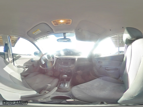 2010 Kia Rio LX with VIN KNADH4A34A6682936, listed as a Copart auction lot 82431724 with 84,528 mi miles and Salvage Title. Bid and sale history available at carsss.com. Image 12.