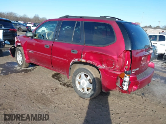 2002 GMC Envoy SLT with VIN 1GKDT13S222517064, listed as a IAAI auction lot 41590087 with 312,164 mi miles. Bid and sale history available at carsss.com. Image 3.