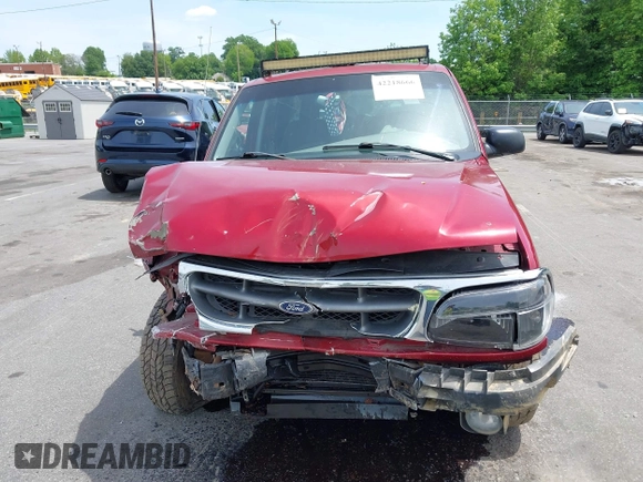 2000 Ford Explorer XLT z VIN 1FMZU73E7YZB60956, wystawiony jako IAAI lot #42218666 z przebiegiem 234 289 mil mil oraz . Historia ofert i sprzedaży dostępna na DreamBid. Obrazek 13.