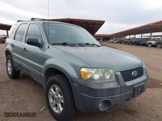 2006 Ford Escape XLT with VIN 1FMYU93136KD49887, listed as a IAAI auction lot 41819143 with 240,537 mi miles. Bid and sale history available at carsss.com. Image 1.