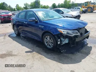 2019 Kia Optima LX z VIN 5XXGT4L32KG345423, wystawiony jako IAAI lot #42309972 z przebiegiem 132 725 mil mil oraz . Historia ofert i sprzedaży dostępna na DreamBid. Obrazek 1.