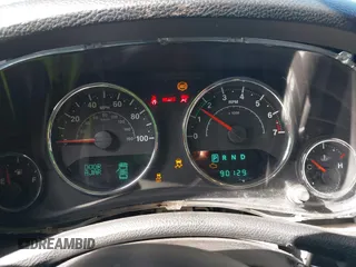 2014 Jeep Wrangler Sport with VIN 1C4AJWAG5EL206565, listed as a IAAI auction lot 42015000 with 90,129 mi miles and . Bid and sale history available at carsss.com. Image 7.